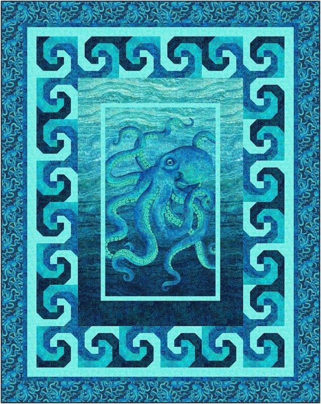 A blue and teal quilt featuring a central octopus illustration set against a watery background, framed by multiple borders with repeating Greek key patterns in various shades of blue—perfect inspiration for wholesale quilt patterns.