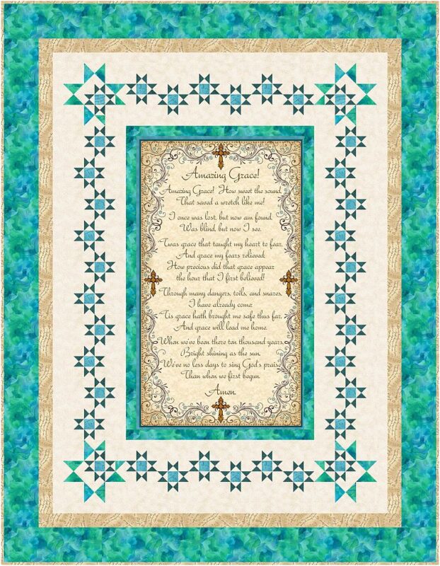 Guided-by-Grace A decorative quilt featuring a bordered pattern of blue, teal, and beige, with star motifs. The center panel displays the hymn Amazing Grace in elegant script, framed by a floral and butterfly design.