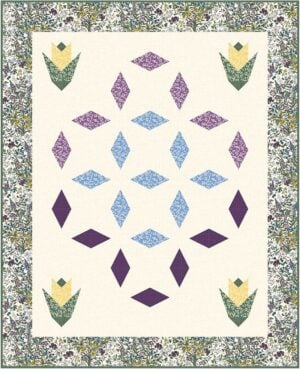 Gem-Dandy quilt with a floral border, featuring three yellow and green tulip shapes in the corners and a central geometric pattern of purple and blue diamond shapes on a cream background.