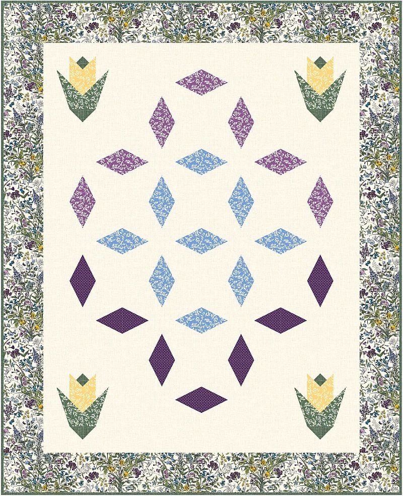 Quilt with a floral border, featuring geometric diamond shapes in purple and blue arranged in a circular pattern, and four yellow and green tulip-like designs in each corner. The central background is cream-colored.