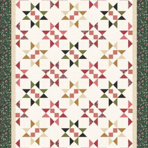 Cider and Cloves throw quilt with garnet, green, and caramel star blocks on a cream background, framed by a dark green floral border