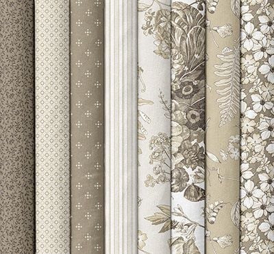 Crossroads Table Runner fabrics, neutral prints in cream, tan, and brown including florals, stripes, and small geometrics